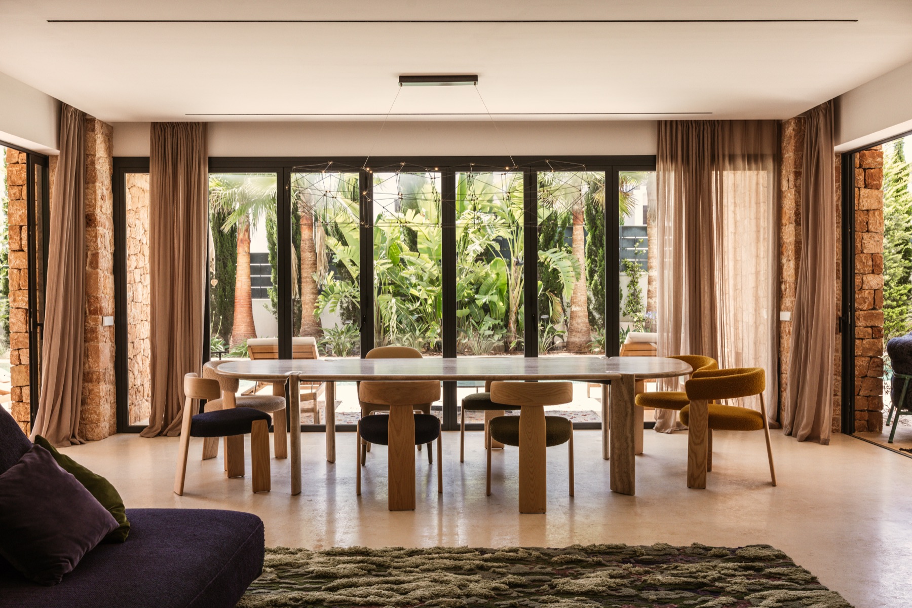 Dining room at Casa Sargamasa opening to tropical planting