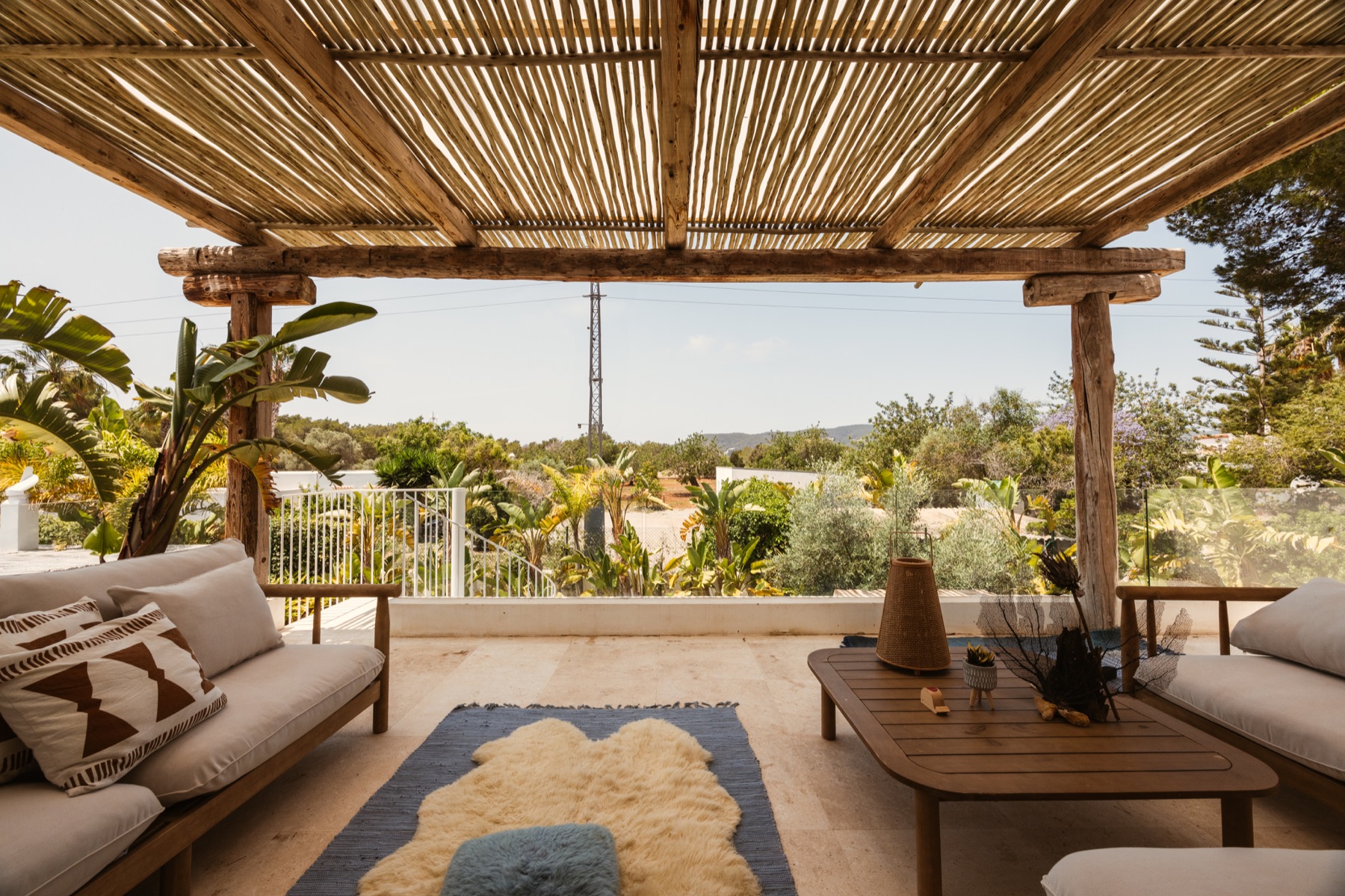 Upper terrace framed by natural timber